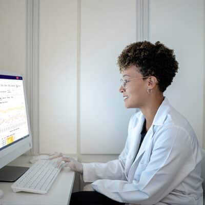 Doctor Reviewing RPM Dashboard