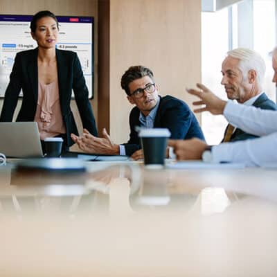 Executives In Conference Room