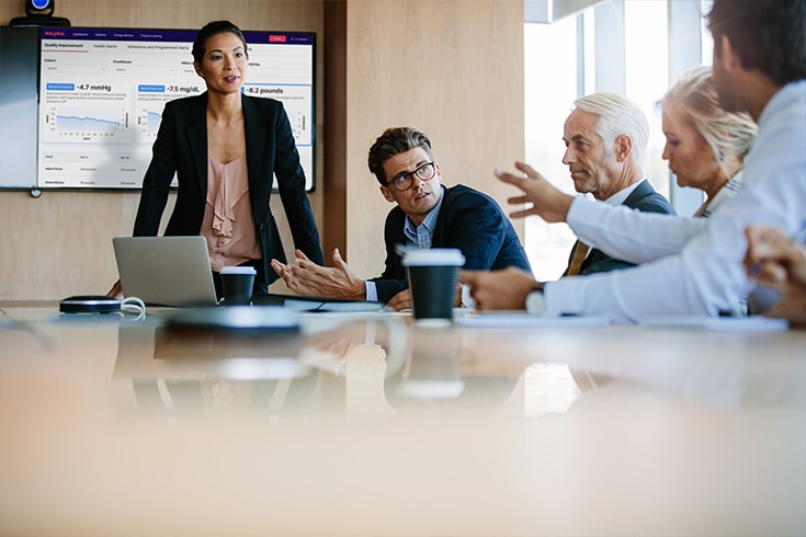 Executives In Conference Room