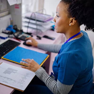 Nurse Adjusting RPM Settings