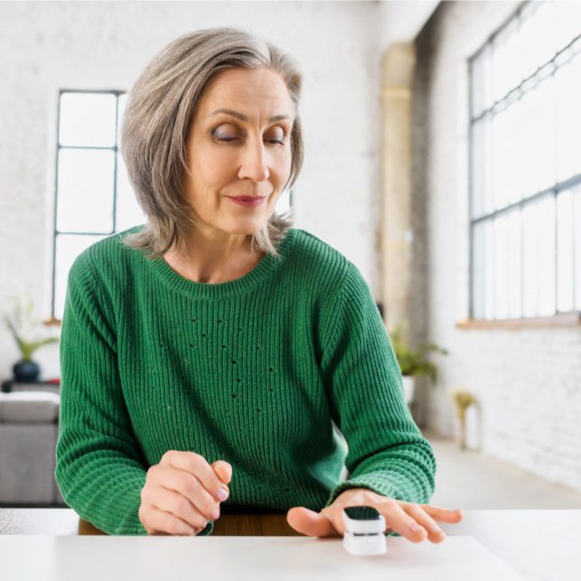 woman in green shirt