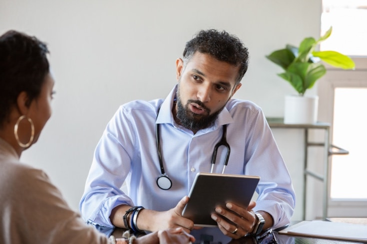 Doctor And Patient In Meeting