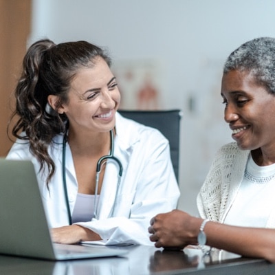 Doctor With Senior Patient